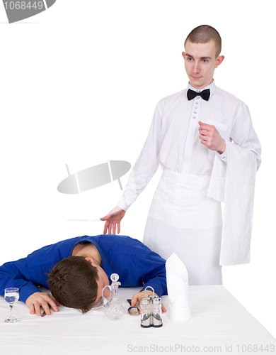 Image of Waiter and drunk guest of restaurant