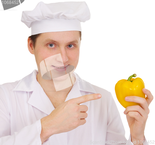 Image of Cook with yellow paprica in hand