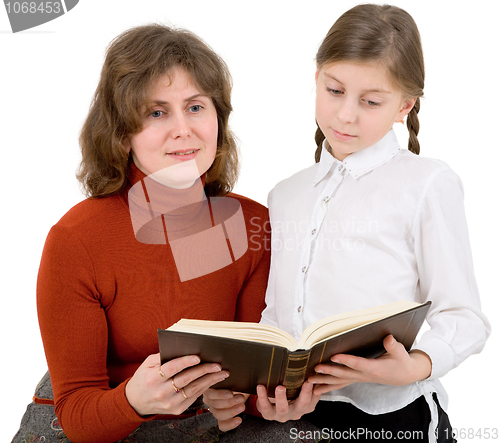 Image of Woman and girl reads the book