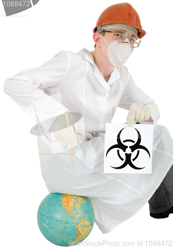 Image of Scientist with poster biohazard sit on a globe