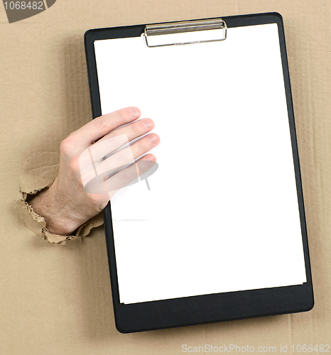 Image of Hand protruding from hole in carton