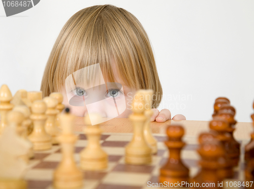 Image of Little girl and chess
