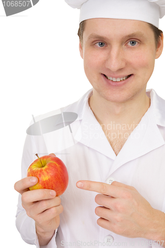 Image of Cook with apple in the hand