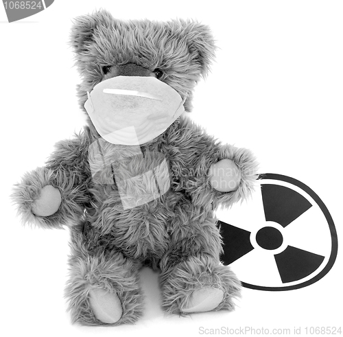 Image of Toy bear and sign to radiation