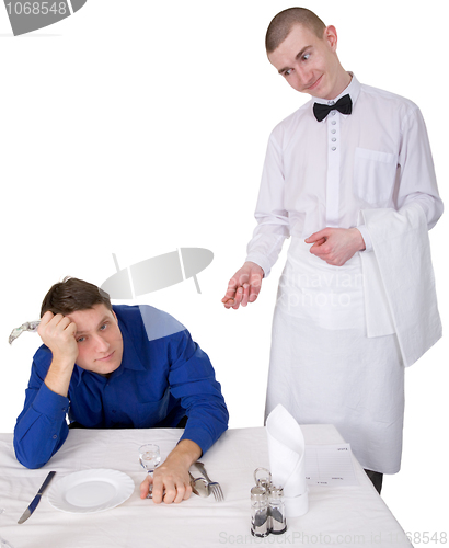 Image of Waiter and guest of restaurant