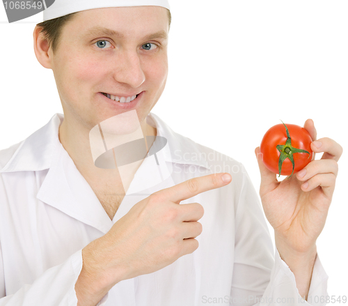 Image of Cook with tomato in hand