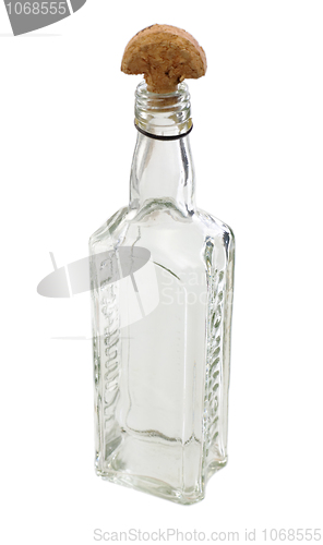 Image of A bottle with a wooden half-round cork 