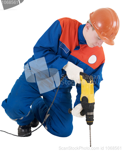 Image of Labourer with hand drill 