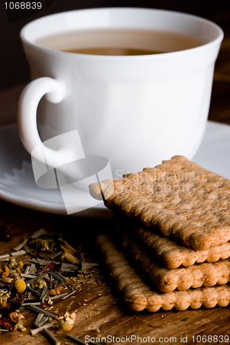 Image of cup of herbal tea and some fresh cookies