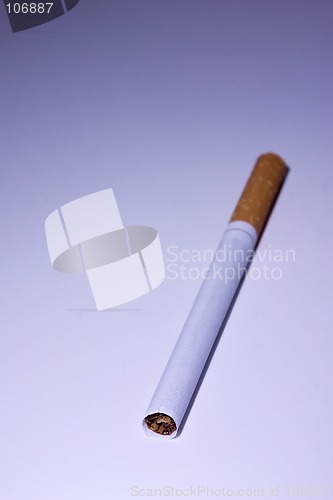 Image of Isolated Cigarette Under Blue Light