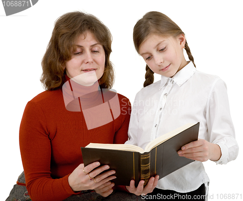 Image of Woman and girl reading book