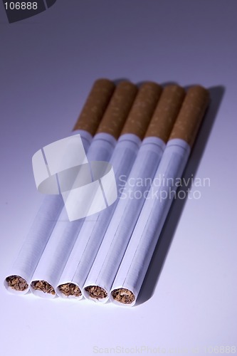 Image of Isolated Cigarettes Under Blue Light