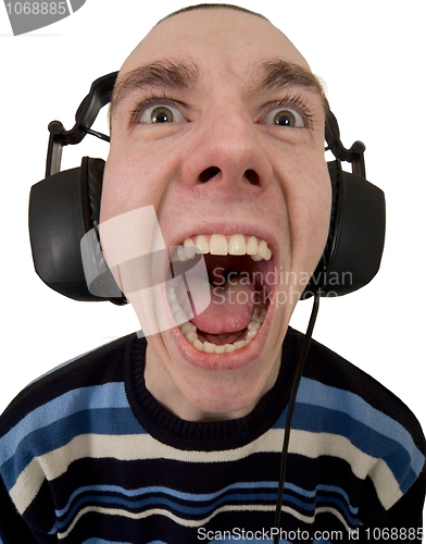 Image of Person in ear-phones shouting