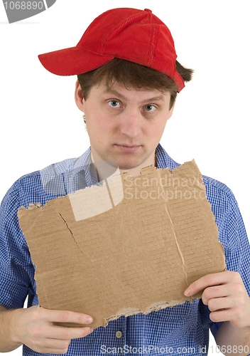 Image of Man in red baseball cap and  tablet