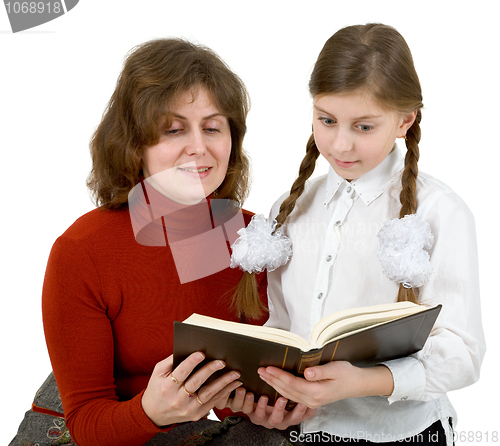Image of Woman and girl reading book