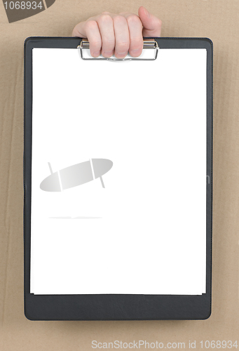 Image of Hand protruding from hole in carton