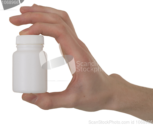 Image of Vial with a drug in a hand