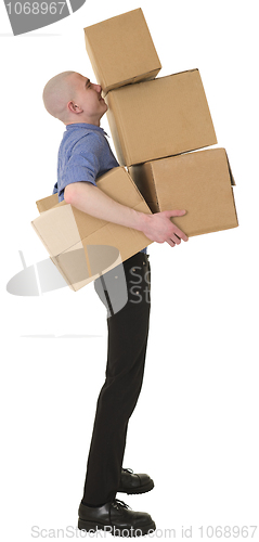 Image of Man holding heap cardboard boxes