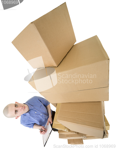 Image of Man and pile cardboard boxes