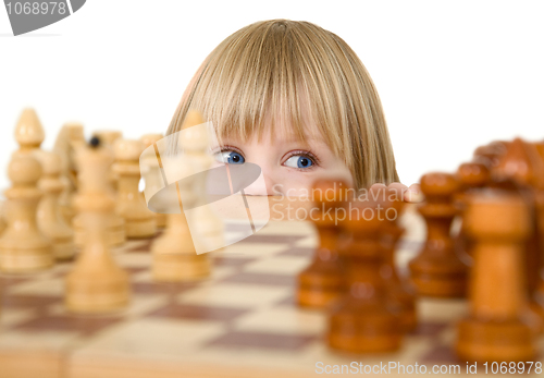 Image of Child ang chess