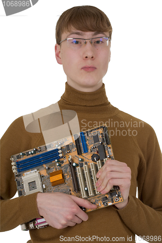 Image of Student with an circuit board