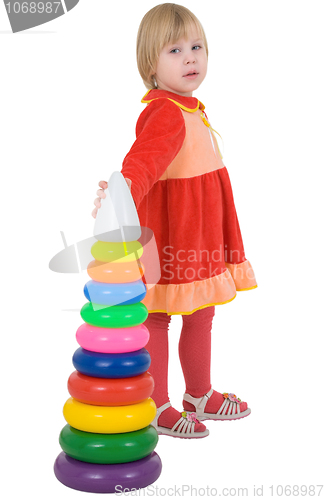 Image of Girl in the red dress with toy