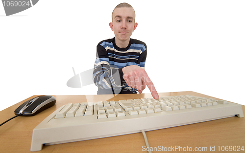 Image of Man working on keyboard and mouse