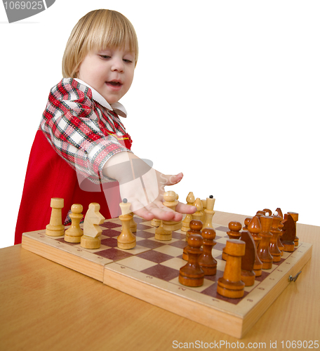 Image of Small girl play chess