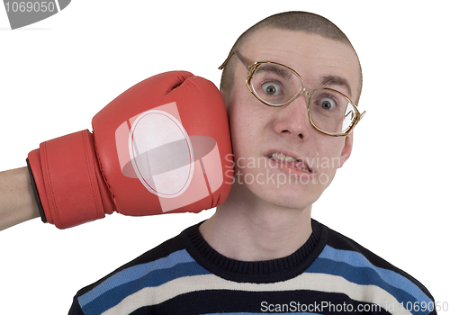 Image of The man in spectacles taking punch 