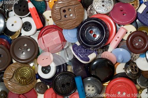 Image of Multicolored plastic button background