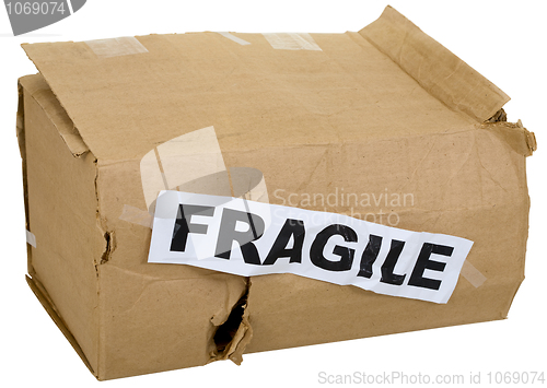 Image of Crumpled cardboard box with inscription "fragile"