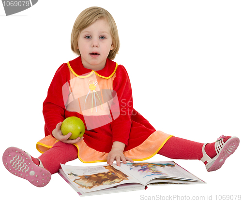 Image of Little girl reading a book