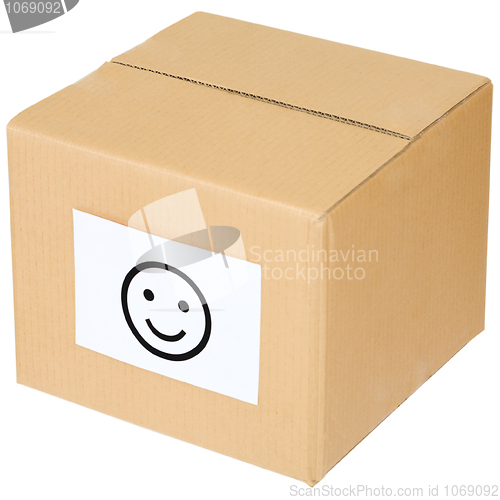 Image of Cardboard box with a smiley sign