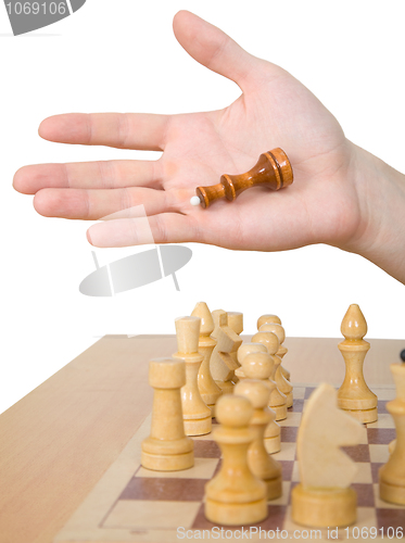 Image of Hand and chess-man