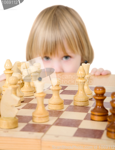 Image of Child ang chess