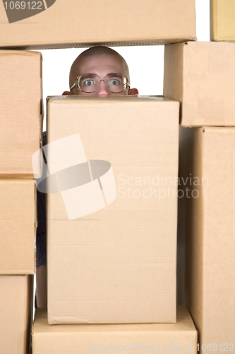 Image of Man and cardboard boxes