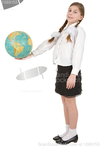 Image of Girl and terrestrial globe on white