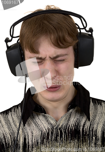 Image of The young man in ear-phones 