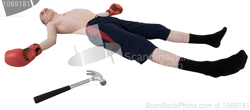 Image of The thin boxer in gloves on the floor