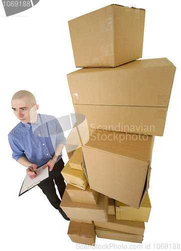 Image of Courier and pile cardboard boxes