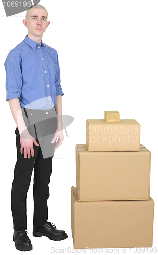 Image of Man in overalls and cardboard boxes