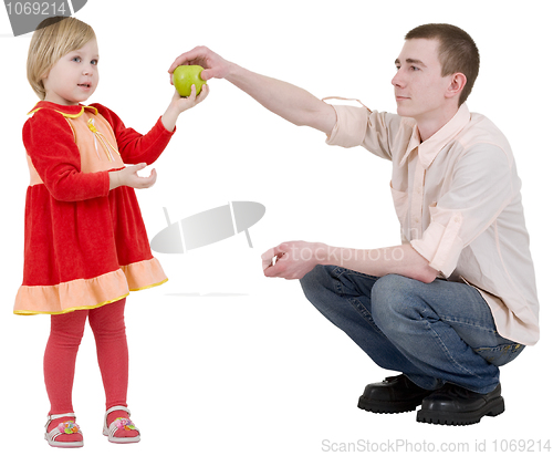 Image of Man give apple to the girl