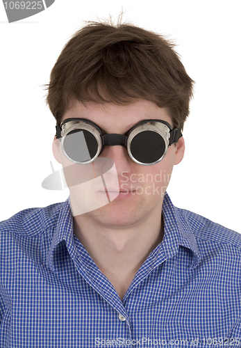 Image of Man in welding goggles