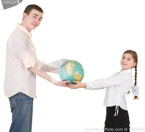 Image of Girl and man hold terrestrial globe