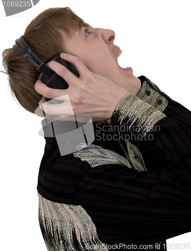 Image of Person in ear-phones shouting