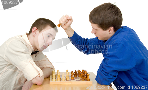 Image of Men play chess