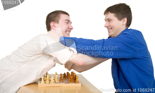 Image of Wrestling boys ang chess