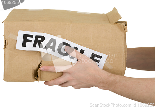 Image of Crumpled cardboard box with inscription "fragile" 