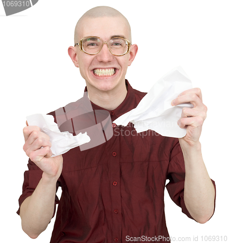 Image of Man tear to pieces paper