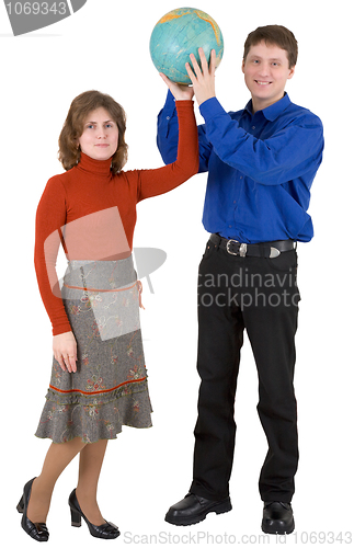 Image of Man and woman hold globe